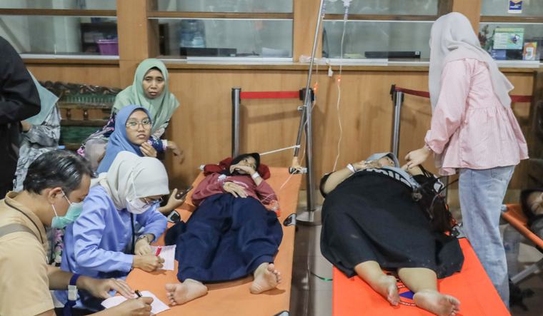 Nearly 2,000 fall ill in suspected food poisoning linked to Indonesia’s free school meals program